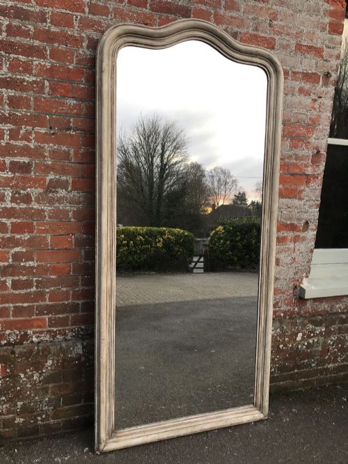 A Fabulous Large Antique 19th Century French 19th Century Carved Wood and Gesso Plain Shaped Top Painted Mirror.