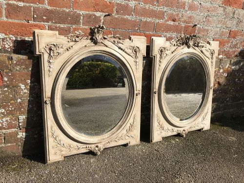 A Stunning Pair of Antique 19th Century French Carved Wood & Gesso Oval Framed Mirrors.