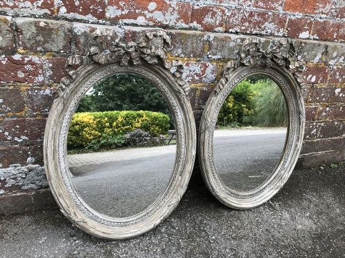 A Highly Unusual Pair of Antique 19th Century French Carved Wood & Gesso Oval Mirrors
