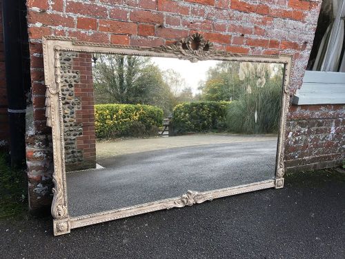 A Spectacular Large Early 20th Century French Carved Wood Painted Mirror.