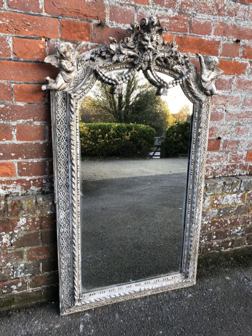 A Stunning Antique 19th Century French Highly Decorative Carved Wood and Gesso Shaped Top Distressed Painted Mirror.