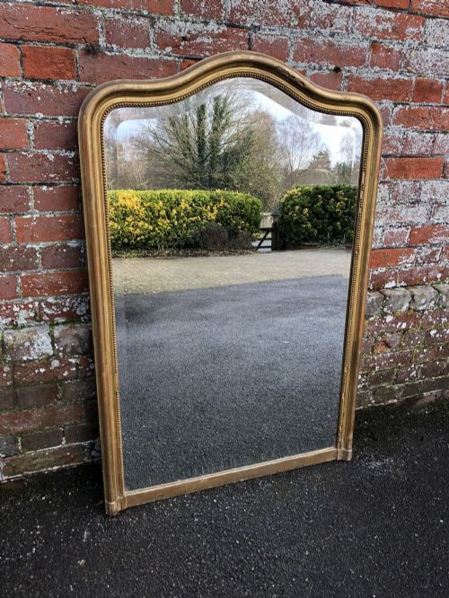 A Delightful Antique 19th Century French Carved Wood & Gesso Original Gilt and Plain Shaped Top Mirror.