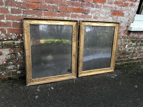 A Spectacular Highly Unusual Pair of Early Antique 19th Century French Carved Wood Original Gilt Louis Philippe Mirrors.