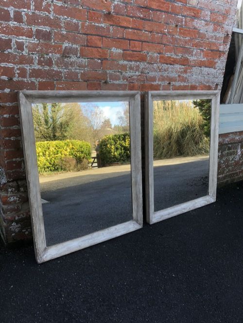 A Stunning Pair of Antique 19th Century French Carved Wood Distressed Painted Plain Mirrors.