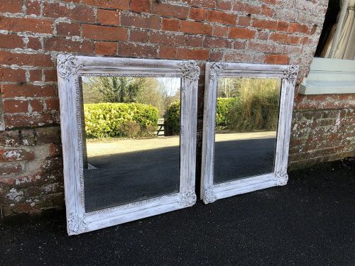 A Delightful Pair of Antique 19th Century French Carved Wood and Gesso Distressed Painted Mirrors.