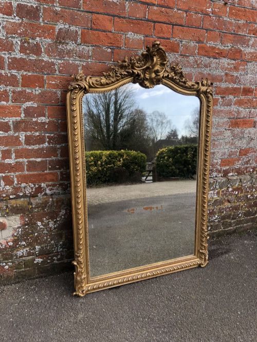 A Fabulous Antique 19th Century French Original Gilt Carved Wood and Gilt Shaped Top Mirror.