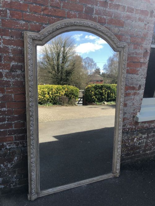 A Superb Large Antique 19th Century French Carved Wood and Gesso Shaped Top Painted Mirror.