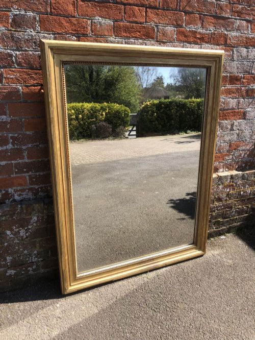 A Delightful Good Size Antique 19th Century French Carved Wood and Gesso Original Gilt Plain Mirror.