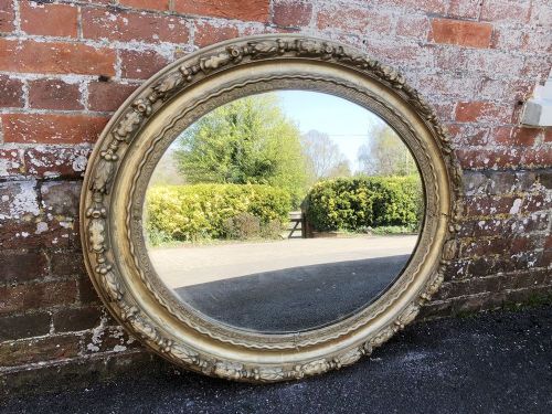 A Stunning Good Size Antique 19th Century French Carved Wood and Gesso Original Gilt Leaf Framed Oval Mirror.