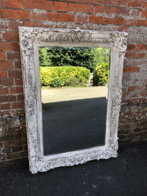A Highly Useful Size Antique 19th Century English Carved Wood and Gesso Distressed Painted Mirror.