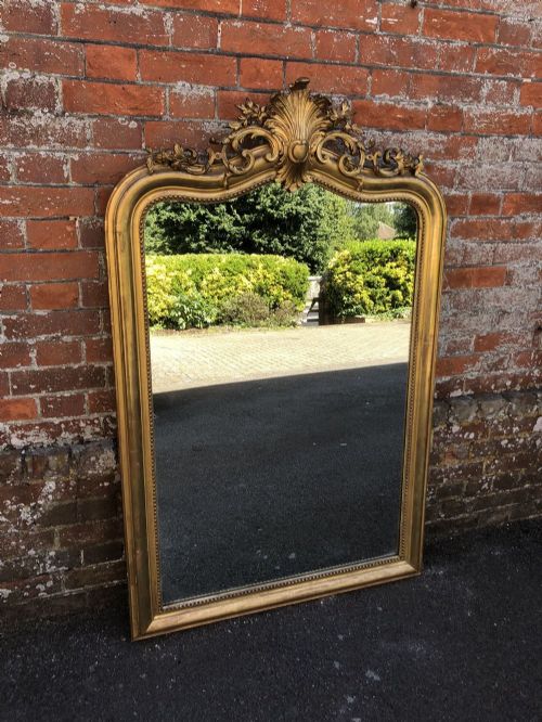 A Stunning Large Antique 19th Century French Carved Wood and Gesso Shaped Top Original Gilt Mirror.
