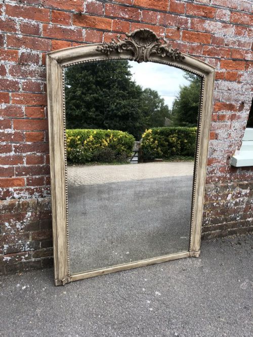 A Stunning Large Antique 19th Century French Carved Wood & Gesso Shaped Top Painted Mirror.