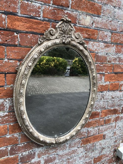 A Highly Useful Size Antique French Carved Wood & Gesso Painted Oval Mirror.