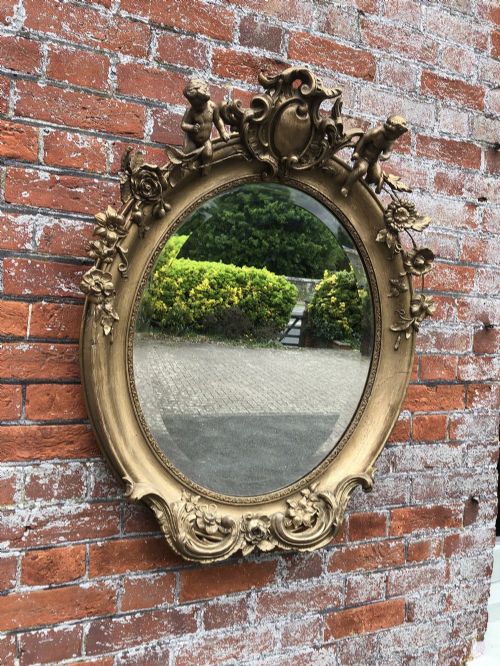 A Stunning Good Size Antique French 19th Century Carved Wood and Gesso Original Gilt Oval Mirror.