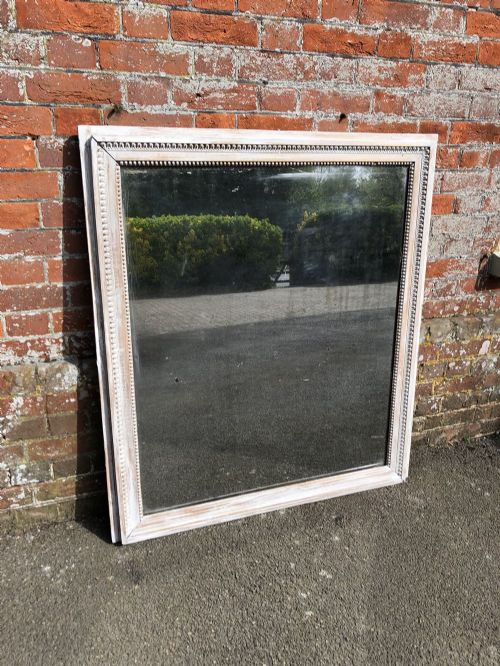 A Delightful Antique French Carved Wood Distressed Painted Ribbed Framed Mirror.