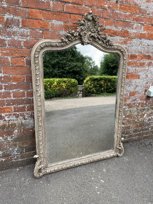 A Stunning Large Antique French 19th Century Carved Wood & Gesso Shaped Top Painted Mirror.