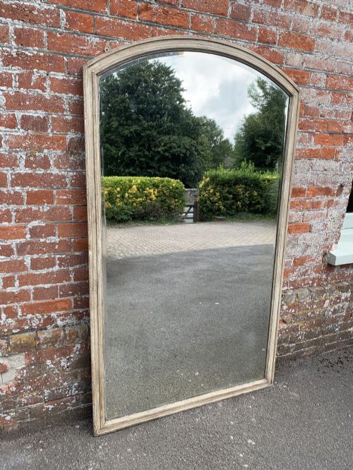 A Delightful Large Antique 19th Century French Carved Wood Painted Shaped Top Plain Mirror.