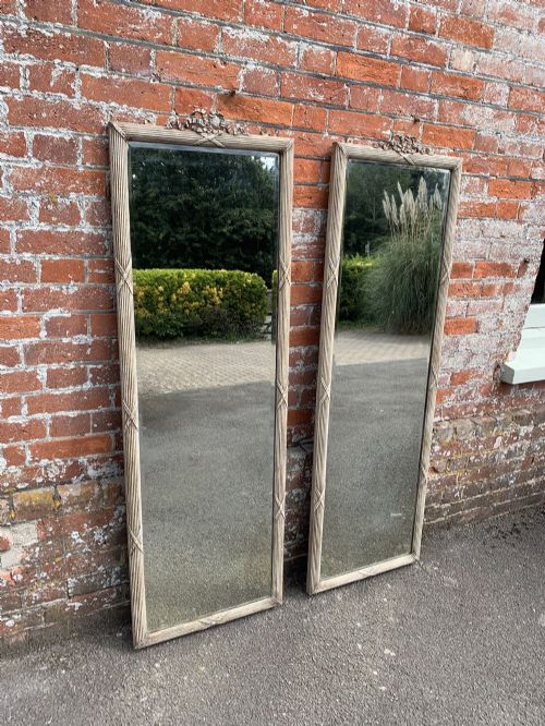 A Spectacular Highly Unusual Pair of Antique 19th Century French Carved Wood & Gesso Painted Ribbed Framed Pier Mirrors.
