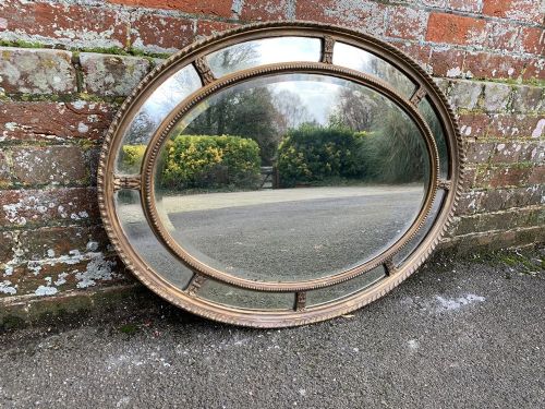 A Fabulous Useful Size Antique English 19th Century Carved Wood and Gesso Original Gilt Oval Sectioned Framed Mirror.