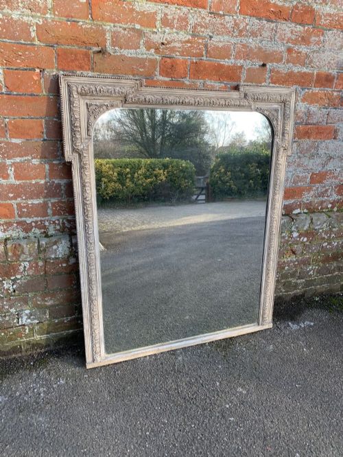 A Highly Useful Antique English 19th Century Carved Wood and Gesso Shaped Top Painted Mirror.