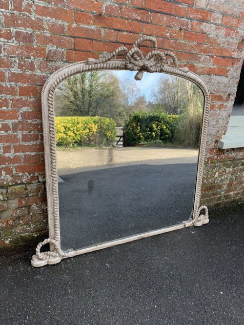 An Exceptional Large Antique English 19th Century Carved Wood and Gesso Shaped Top Overmantle Mirror.