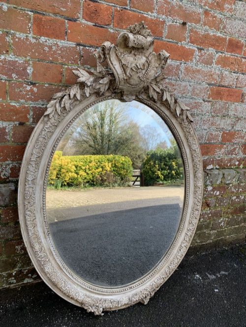 A Fabulous Good Size Antique French 19th Century Carved Wood and Gesso Painted Oval Mirror.