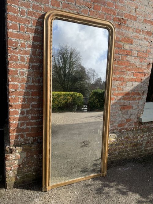 A Spectacular Large Antique French 19th Century Carved Wood and Gesso Original Gilt Shaped Top Mirror.