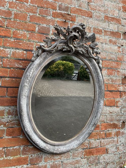 A Fabulous Good Size Antique French 19th Century Carved Wood and Gesso Distressed Painted Oval Mirror.