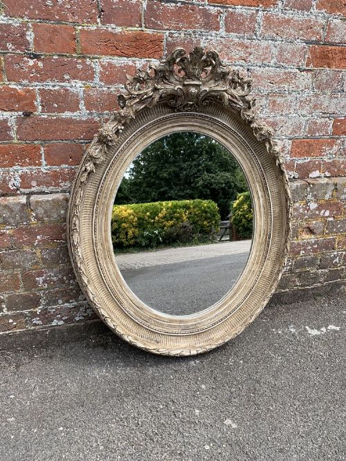 A Fabulous Useful Size Antique French 19th Century Carved Wood and Gesso Painted Oval Ribbed Framed Mirror.