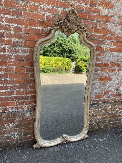 A Stunning Large Antique French 19th Century Carved Wood Shaped Top Painted Mirror.
