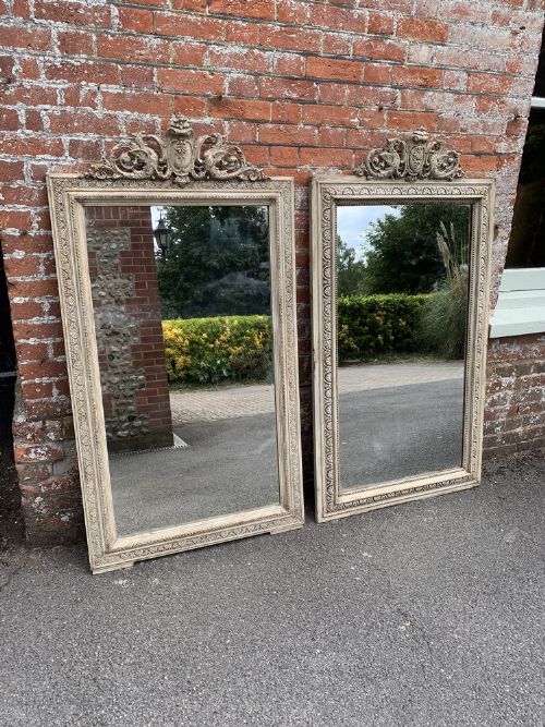 A Spectacular Near Pair of Antique French 19th Century Carved Wood & Gesso Painted Mirrors.
