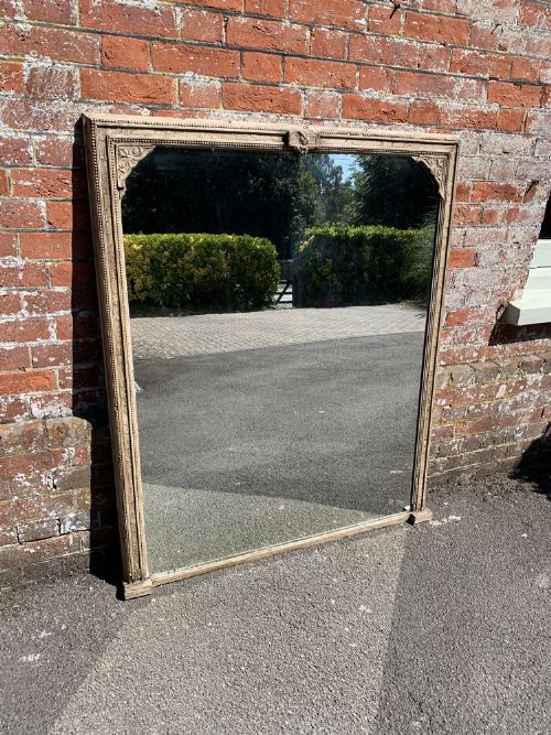 A Highly Useful Antique English 19th Century Carved Wood and Gesso Painted Overmantle Mirror.
