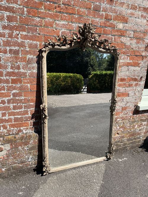 A Spectacular Large Antique French 19th Century Carved Wood & Gesso Shaped Top Painted Mirror.