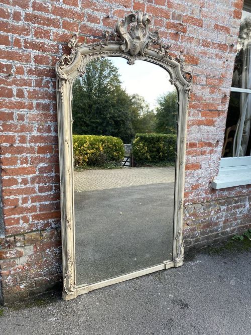 A Spectacular Large Antique French 19th Century Carved Wood and Gesso Painted Shaped Top Mirror.