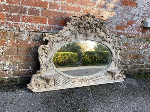 A Highly Useful Size Antique 19th Century English Carved Wood and Gesso Painted Overmantle Mirror.