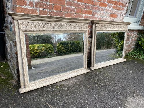 A Fabulous Highly Unusual Pair of Antique English 19th Century Carved Wood and Gesso Painted Overmantle Mirrors.