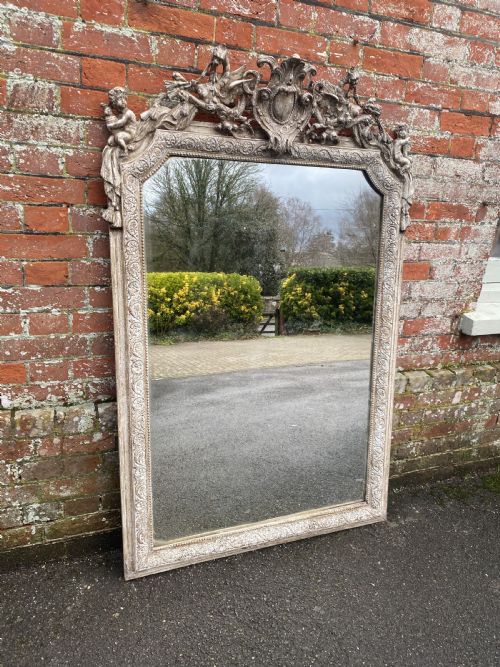 A Stunning Large Antique French 19th Century Carved Wood & Gesso Shaped Top Painted Mirror.