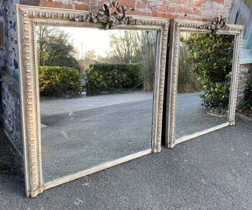A Fabulous Pair of French 20th Century Carved Wood Painted Mirrors
