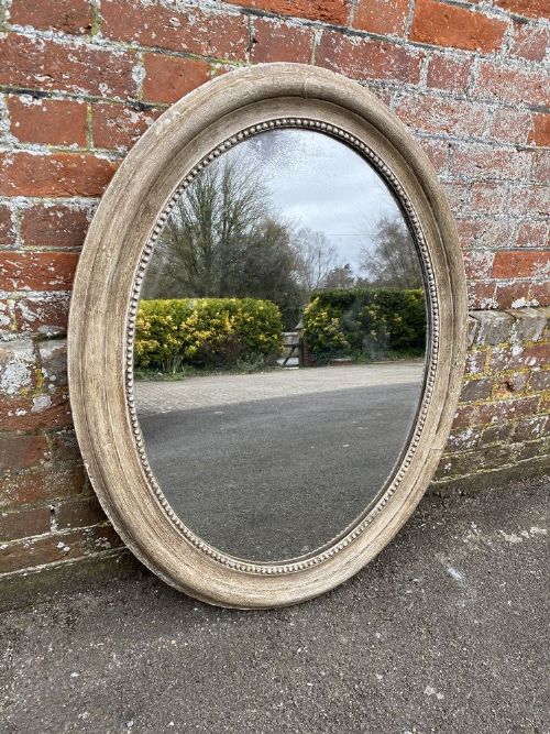 A Wonderful Good Size Antique French 19th Century Carved Wood and Gesso Painted Oval Mirror.