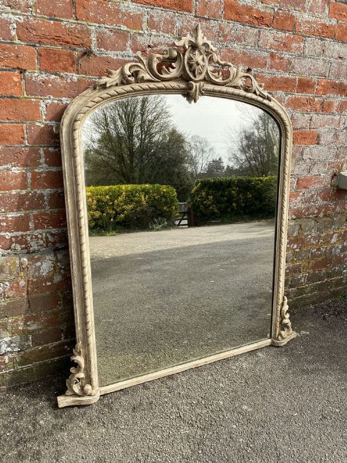 An Impressive Large Antique English 19th Century Carved Wood and Gesso Painted Overmantle Mirror.