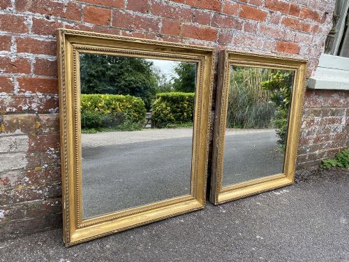 A Stunning Pair of Antique French 19th Century Carved Wood & Gesso Original Gilt Mirrors.