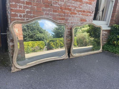 A Fabulous Highly Unusual Near Pair of Antique French 19th Century Carved Wood Painted Shaped Mirrors.