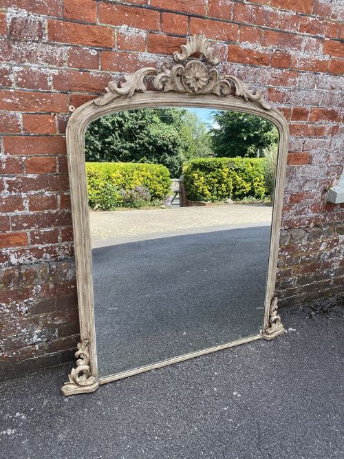 A Delightful Antique English 19th Century Carved Wood Arched Top Painted Overmantle Mirror.