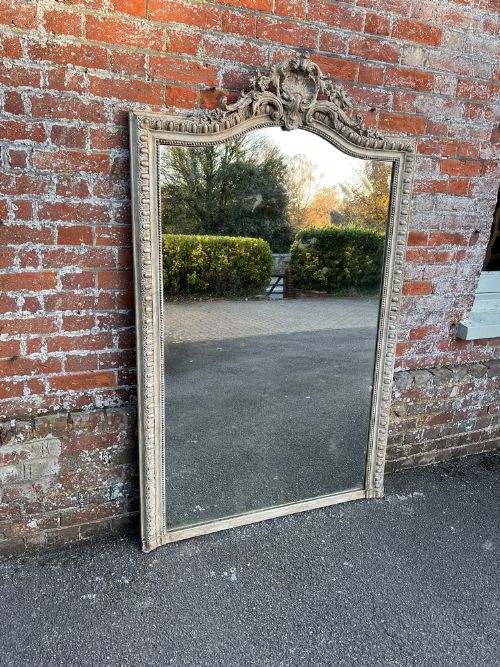 A Superb Large Antique French 19th Century Carved Wood & Gesso Shaped Top Painted Mirror.