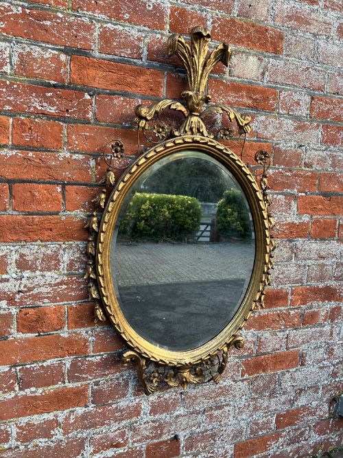 A Stunning Good Size Antique English 19th Century Carved Wood Gilt Oval Mirror.