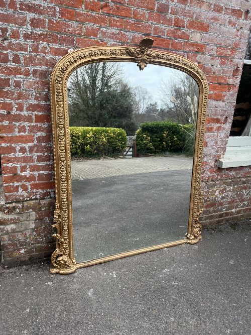 An Exceptional Large Antique English 19th Century Carved Wood & Gesso Git Arched Top Overmantle Mirror.