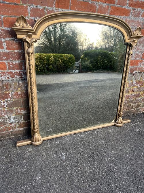 A Delightful Highly Useful Size Antique English 19th Century Shaped Top Rope Twist Framed Gilt Overmantle Mirror.