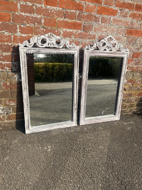 A Wonderful Near Pair of French Early 20th Century Carved Wood Distressed Painted Mirrors.