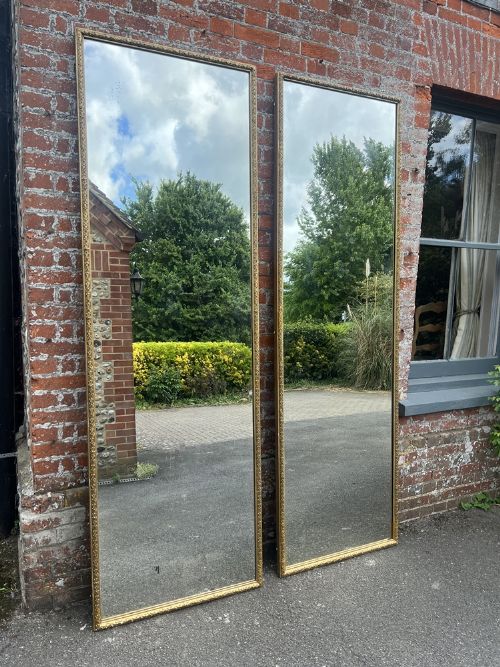 A Spectacular Pair of Large Antique English 19th Century Carved Wood & Gesso Gilt Level Leaf Framed Pier Mirrors.