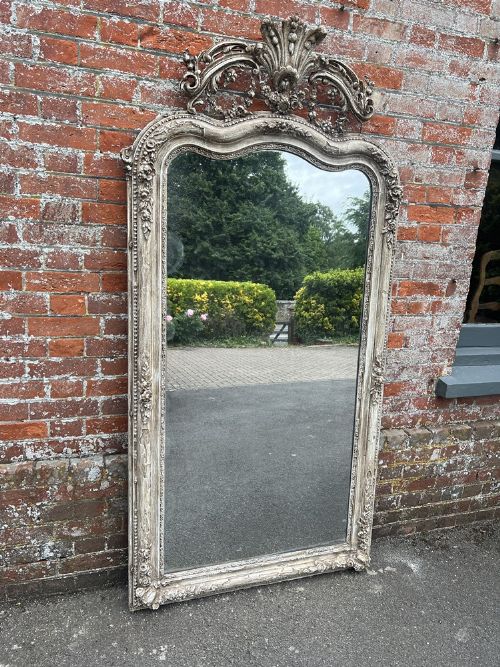 A Spectacular Large Antique French 19th Century Carved Wood & Gesso Shaped Top Painted Mirror.